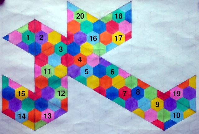 Ikosaedrin verkko, jonka päälle on piirretty jokaiselle tahkolle numero, mutta jossa numerot ovat jonkinlaisessa järjestyksessä.