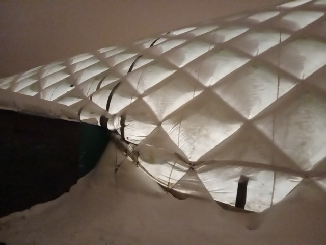 A close-up of the dome, with the light from the inside outshining the sky.
